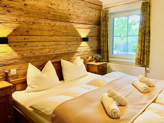 Landhaus-Angerhof-apt-BBE-bedroom-double-bed-overv