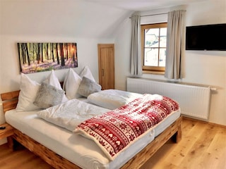 Chalet Mama, Schlafzimmer mit Doppelbett, 2 Einzel