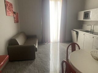 Küche mit Schlafsofa