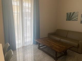 Wohnzimmer mit Doppelschlafsofa