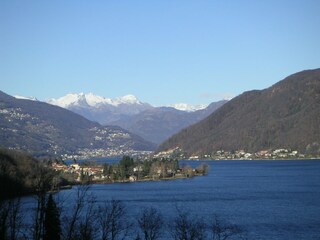 View of Brusimpiano and the mountains