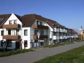 Haus Achtern Diek mit Hafenblick