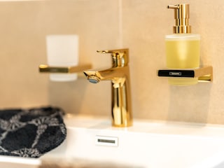 Vergoldete Armaturen als edles Highlight