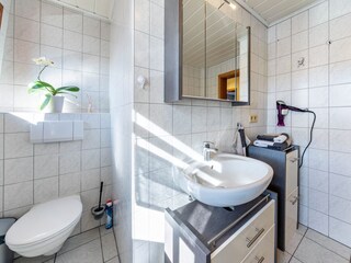 Bathroom with shower and bathtub
