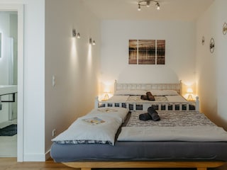 Schlafbereich mit ausgezogener Couch Whg. Elisa