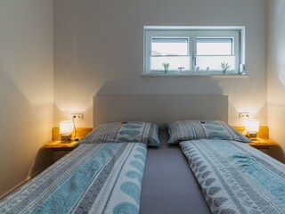 Schlafzimmer mit Beleuchtung Wohnung Marlena