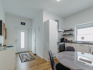 Vorraum u. Küche mit Essbereich Wohnung Marlena