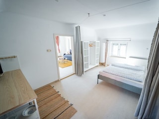 7_Marille_Bett_Wohnzimmer