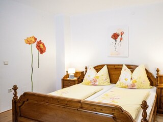 Gemütliches rustikales Doppelbett