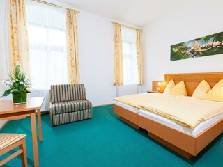 Doppel- oder Dreibettzimmer