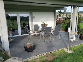 Terrasse mit Windfang