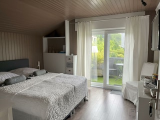 extra Zimmer Junior suite mit Schiebetür zum Teras