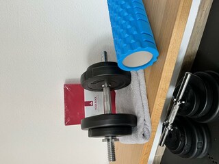 Yoga und Kurzhanteln
