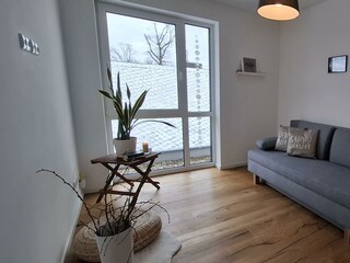 Kleines Zimmer mit Doppelschlafsofa