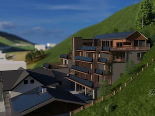 Goldhirsch Aparthotel im Sommer