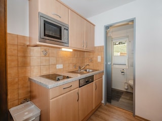 appartement-edelweiss1-kueche1-haus-ortsblick-wagr