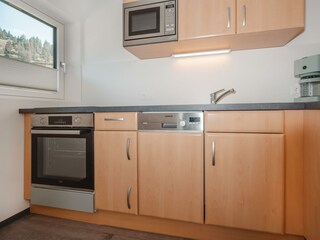 appartement-edelweiss2-kueche-haus-ortsblick-wagra