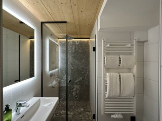 Genießen Sie die walk-in Regenwalddusche