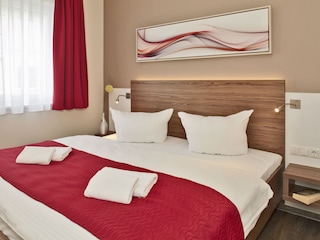 Schlafzimmer und weiteres einzel  Bett