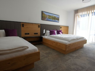 Dreibettzimmer
