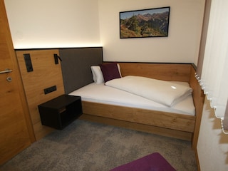 Einzelzimmer mit französischem Bett
