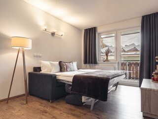 Appartement Alpenrose_Schlafsofa im Wohnbereich