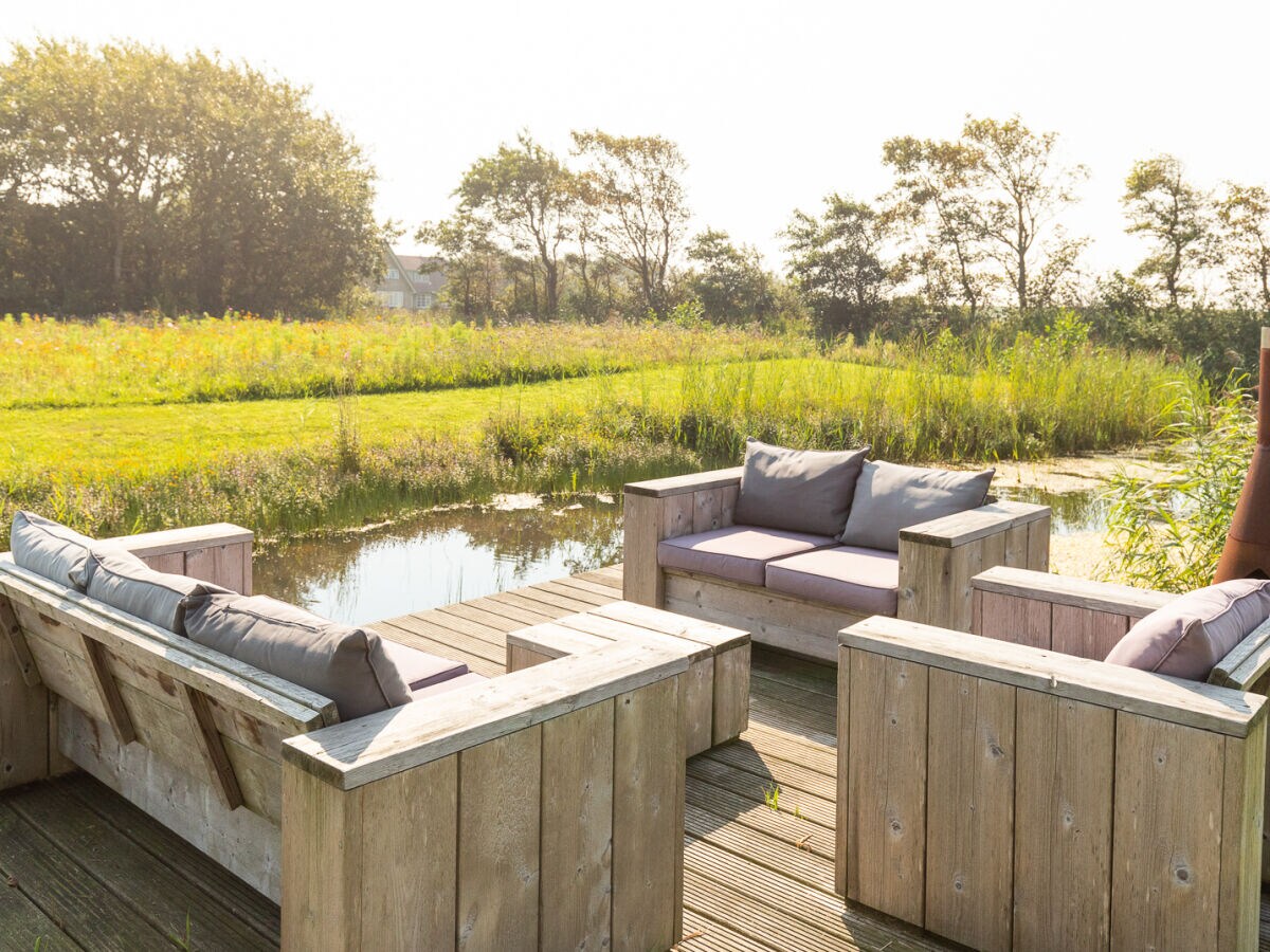 Enjoy in the lounge benches by the water