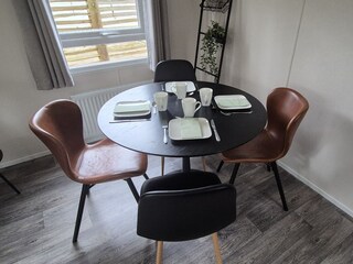 The dining table is perfect for family meals.