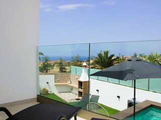 View from terrace onto garden and sea