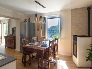 Wohnraum mit Schlafcouch  und Terrasse