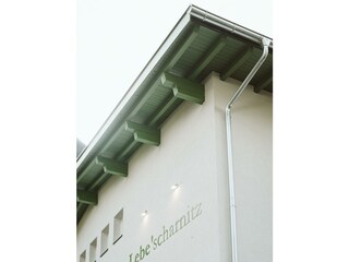 Ansicht Schriftzug Hauswand