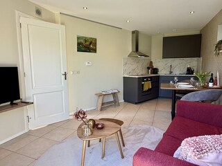 Wohnzimmer mit Küche