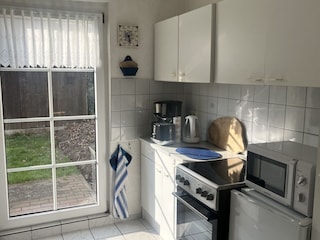 Küche mit Ausgang Terrasse