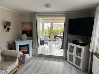 Wohnzimmer mit Wintergarten
