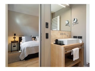 Schlafzimmer mit Bad ensuite