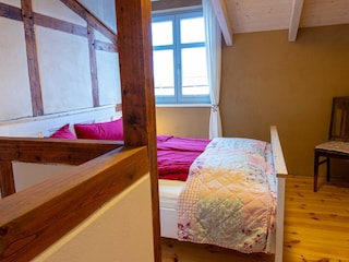 Schlafzimmer mit Doppelbett
