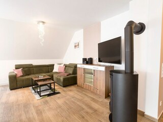 Wohnzimmer mit Kamin