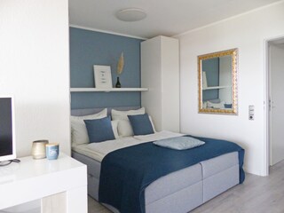 Schlafnische mit Boxspringbett
