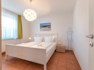 Schlafzimmer 1 mit Doppelbett