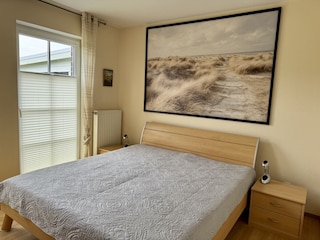 Schlafzimmer mit Doppelbett