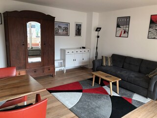 living room with retracted bedsofa