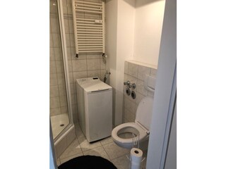 bathroom with washingmachine