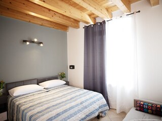 Schlafzimmer (option 1 Doppelbett) mit sofa