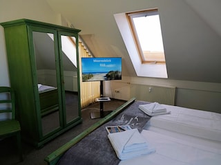 Schlafzimmer mit Doppelbett