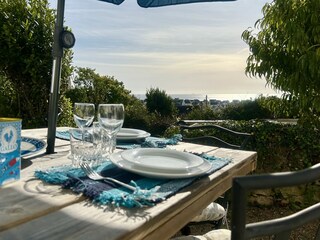 Garden dinner overlooking the sea