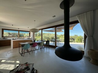 Spacious living and dining area with open kitchen