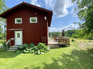 Red wood cottage with terrace