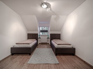 Schlafzimmer 1 mit 2 Einzelbetten