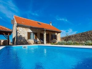 Maison de vacances Maison de trois chambres avec piscine - Puljane - image1