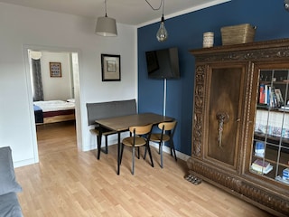 Dining area, view into the bedroom